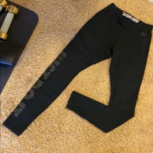 Black on black Nike sportswear leggings